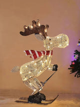A collection of lighted skiing reindeer Christmas yard decorations with LED lights, displayed in both indoor and outdoor settings.