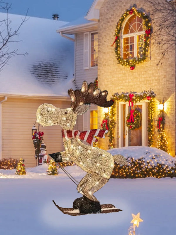 A collection of lighted skiing reindeer Christmas yard decorations with LED lights, displayed in both indoor and outdoor settings.